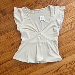 V neck cream top